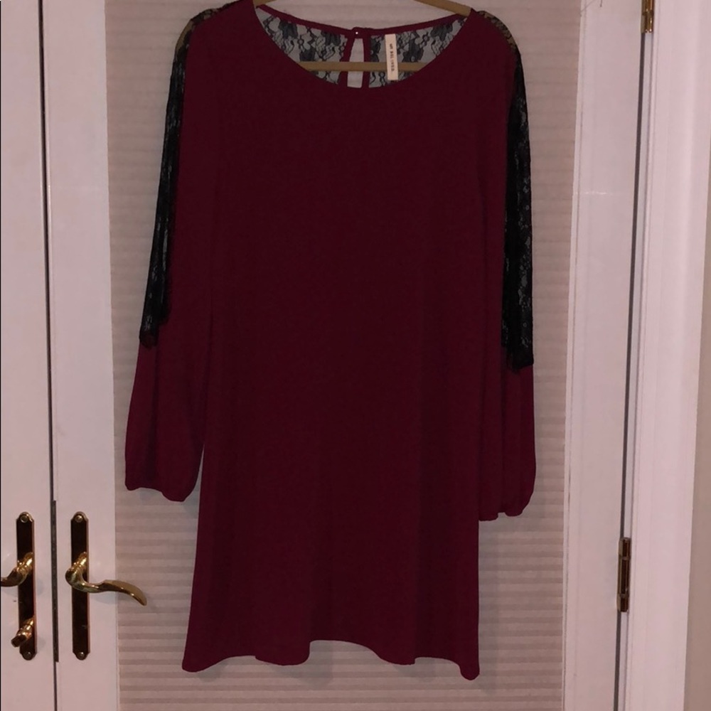 Burgundy dress with black lace back and sleeves